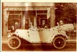 Car in front of W. J. Quinn Bakery, Thessalon, 1936