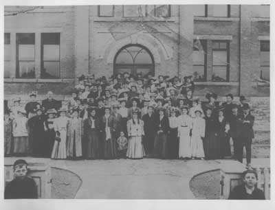 Adult Group Photo in front of Thessalon School, circa 1910