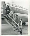 Marilyn Mills and 4-H Members Board Plane, 1970