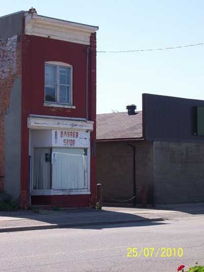 East side of Main Street, Between Huron and Algoma (Formerly Delhenty's Barber Shop)