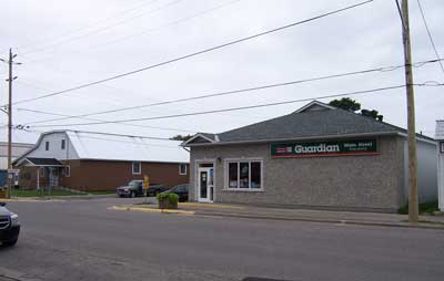 West side of Main Street (corner of Algoma and Main)