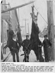 Three Young Men with Moose and Deer, Main Street, Thessalon, circa 1912