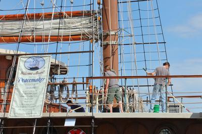 Swabbing the decks - tallship Peacemaker