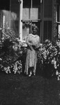 Lucy Maud Montgomery in her garden at Norval, ON. 1932.