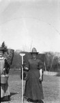 Stella Campbell & Lucy Maud Montgomery (spring cleaning), ca.1920's.  Park Corner, P.E.I.