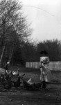 Stella Campbell - feeding chickens, ca.1900.  Park Corner, P.E.I.