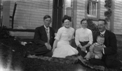 Rev. John Stirling, Margaret Ross Stirling, Mabel Simpson McIntosh, Rev. Major Hooper McIntosh & baby Douglas McIntosh.  Cavendish Manse, 1910.