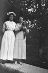 "Frede" Campbell, Nurse Fergusson & Daffy the cat, 1912.  Leaskdale, ON.  (vol. 2 p.100)