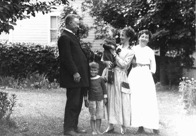 The Macdonald family with Bertie McIntyre, ca.1918.  Leaskdale, ON.