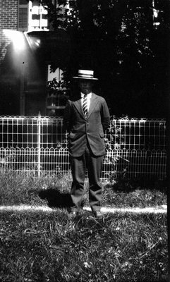 Chester standing in front of fence, Norval, ON.