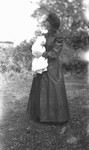 Chester being held by his mother Lucy Maud Montgomery.