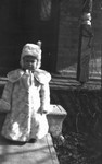 Chester as a toddler wearing fur coat and hat, Leaskdale, ON.