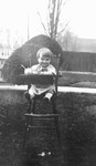 Stuart in high chair age 1 1/2 years, ca.1917.  Leaskdale, ON.