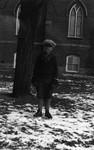 Stuart Macdonald with skates, age 8 (?), ca.1923.  Leaskdale, ON.