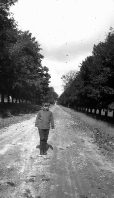 Stuart standing in the middle of the road, Leaskdale, ON.