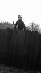 Stuart climbing over the fence, Leaskdale, ON.