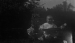 Stuart as a baby out in the garden, Leaskdale, ON.