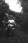 Lucy Maud Mongomery's step brother Carl - son of H.J. Montgomery & 2nd wife - seen holding Stuart, ca.1918.  Leaskdale, ON.