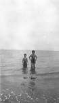 Stuart & Chester standing in water, P.E.I.