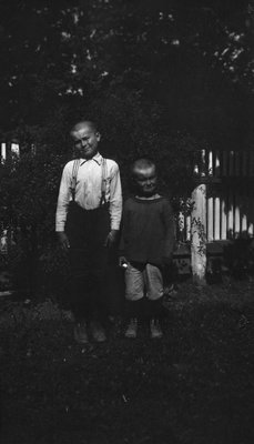 Chester & Stuart.  Shaved heads in summer in Leaskdale to save hair cuts and prevent lice.  Leaskdale, ON.