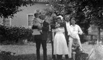 Chester, Stuart, Ewan Macdonald, Mr. Fraser & daughter (Ewan hugging 1 unidentified girl), ca.1920.  Leaskdale, ON.