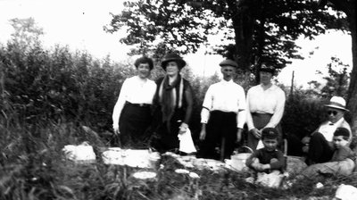 Roadside picnic on way to Bala, ON. - Lucy Maud Montgomery, Ewan, Stuart, Chester, Rev. Alonzo Smith & wife and friend (?), ca.1921.  Leaskdale, ON.