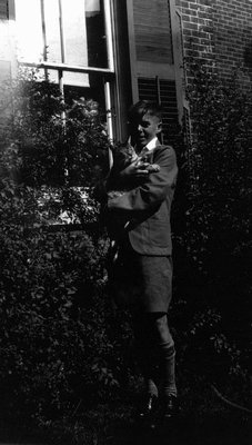 Tobie Campbell (?) with cat, ca.1928.  Norval, ON.