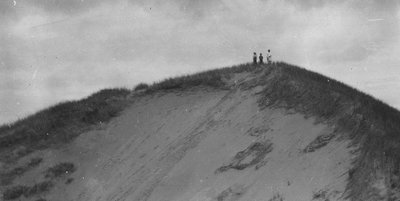 Three (unidentified) figures on Sand Dune, Cavendish P.E.I.