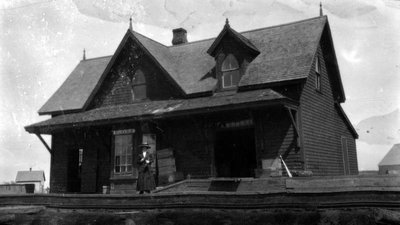 Ellerslie Station (Lucy Maud Montgomery in photo?), ca.1895. Ellerslie,  P.E.I.