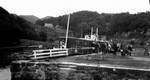 Passengers disembarking from boat (Honeymoon, 1911)