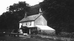 House with ivy-covered porch. (Honeymoon, 1911)