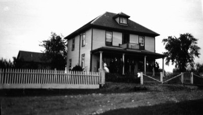 Group on the veranda of Mr. Cook's house.  Leaskdale, ON.