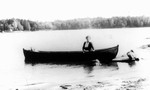'Dreaming' - Lucy Maud Montgomery in canoe.