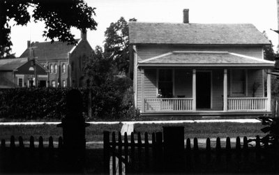 View from Norval Manse's parlor window to John Macpherson's house (one brother who married) and 'ugly United Church!'