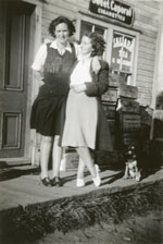 Kate Scarr and Lillian Follick, in front of Scarr's Store, circa 1930