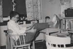 Student in dormitory room, Willison Hall, Waterloo College