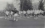 Majorettes and marching band in Waterloo College Homecoming Parade, 1957
