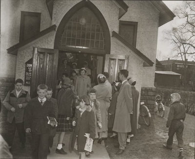 People in front of Zion English Evangelical Lutheran Church, Sault Ste. Marie, Ontario