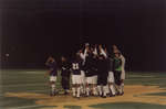Wilfrid Laurier University soccer players on field