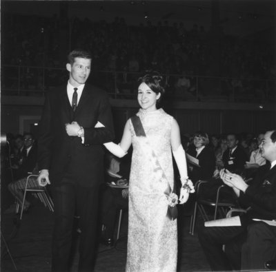 Miss Waterloo Lutheran University 1968 and her escort