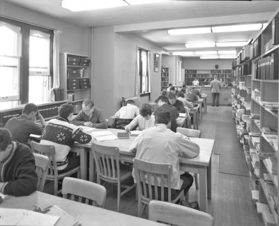 Students in library, Willison Hall, Waterloo Lutheran University