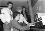 Wilfrid Laurier University staff and students using a computer