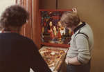 Two students playing pinball in the Students' Union games room, Wilfrid Laurier University