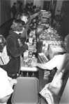 Students shopping at Millie's Mini Market, Wilfrid Laurier University