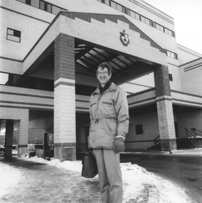 John Laurence standing in front of John Aird Centre