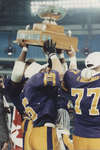 Wilfrid Laurier University players holding Vanier Cup, 1991