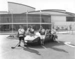 Wilfrid Laurier University hockey players in front of Waterloo Memorial Recreation Complex