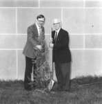 Richard Crossman and Otto Heick planting a tree