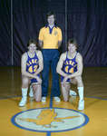 Chris Coulthard and two Wilfrid Laurier University basketball players