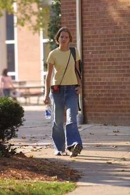 Female student walking on Wilfrid Laurier University campus